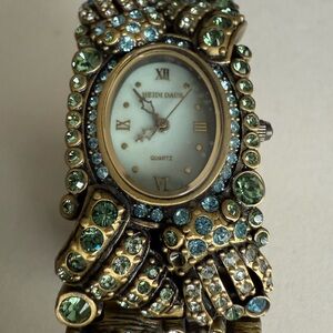 Heidi Daus Ornate Gold Tone Watch with Blue and Green Crystals